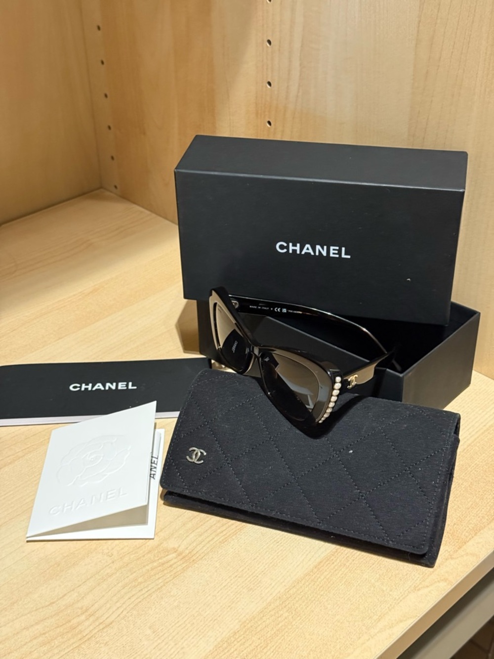 CHANEL Black Cat-Eye Sunglasses with Pearl Accent